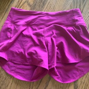 Lululemon Speed Up mid rise lines short 4”